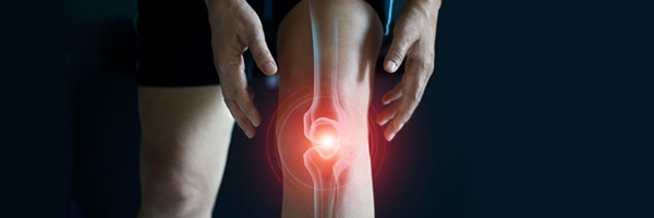 person suffering from pain in knee