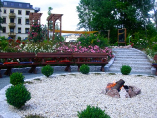 gardens and stone steps with hospital building in background