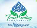 Text says "True Healing Conference: The New biology" will stylized illustration of lotus flower; background is soft blue sky and water ripples
