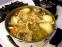 soup stock with chicken, onions, carrots